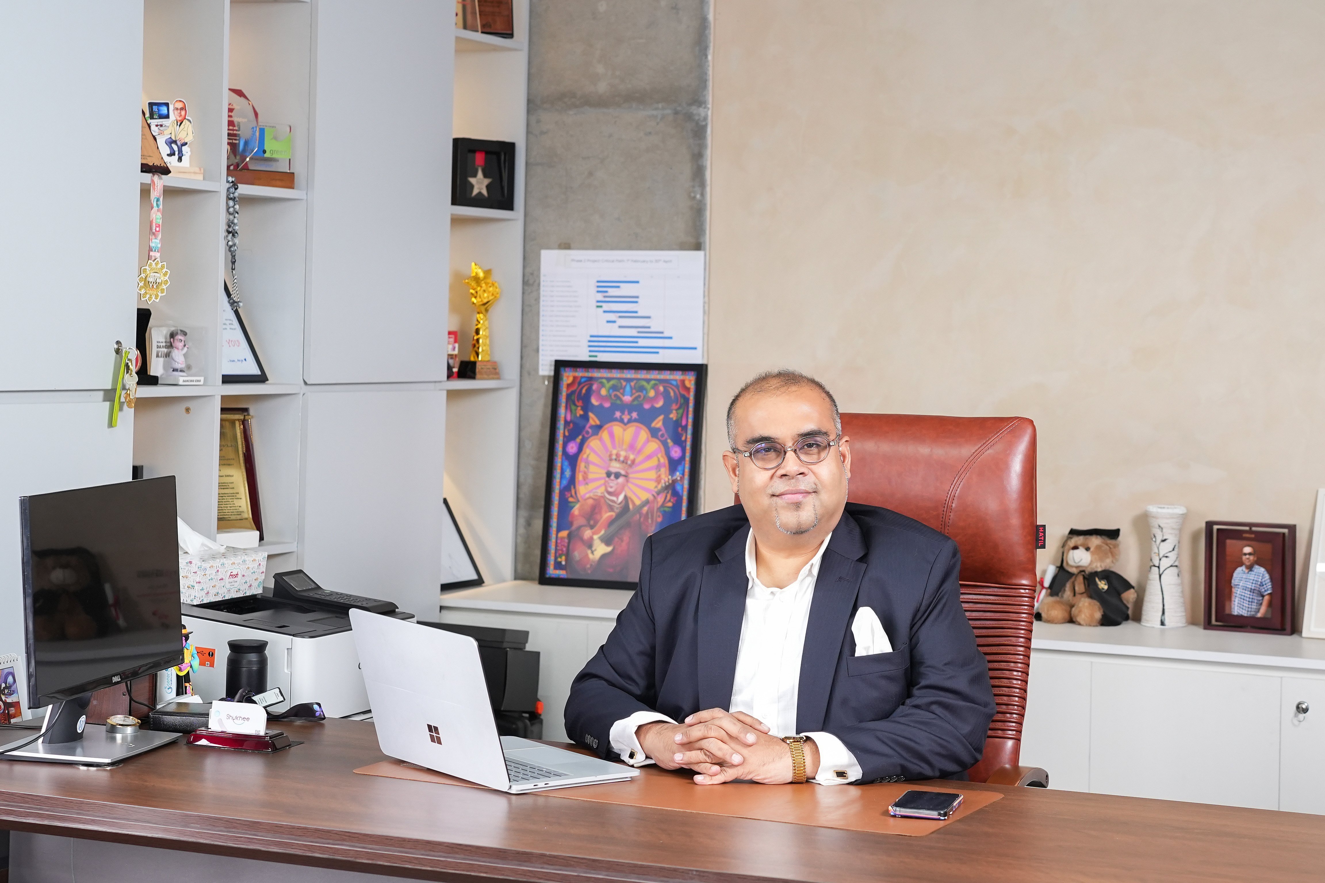 Dr. Ahmed Armaan Siddiqui at his executive desk in Grameen Healthtech headquarters